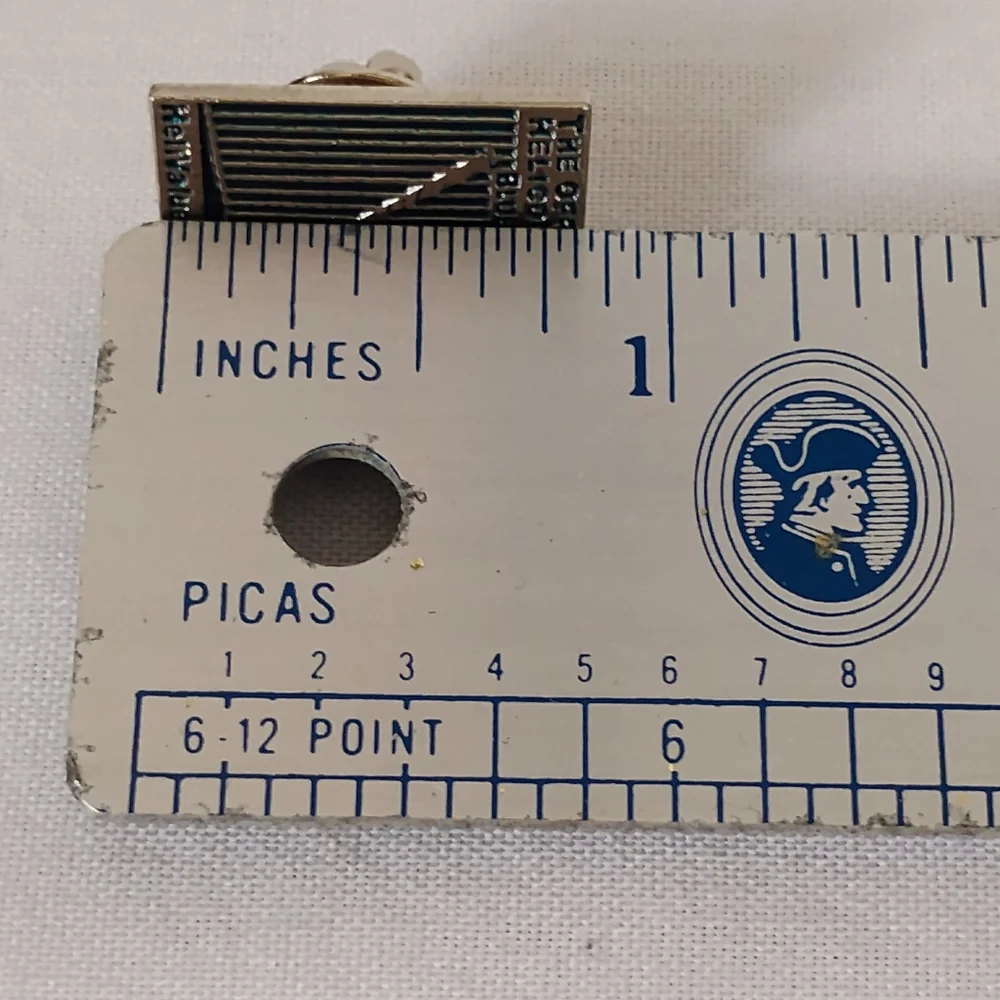 HeliValue$ Inc. The Official Helicopter Blue Book Enamel Lapel Pin Hat Bag Shirt